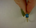 14K YELLOW GOLD AND BLUE TOPAZ BUJUKAN RING - SIZE 6.5