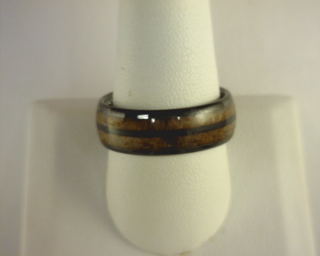 Steel Revolt CHURCHILL II is an 8mm ring made with cigar leaf inlay.