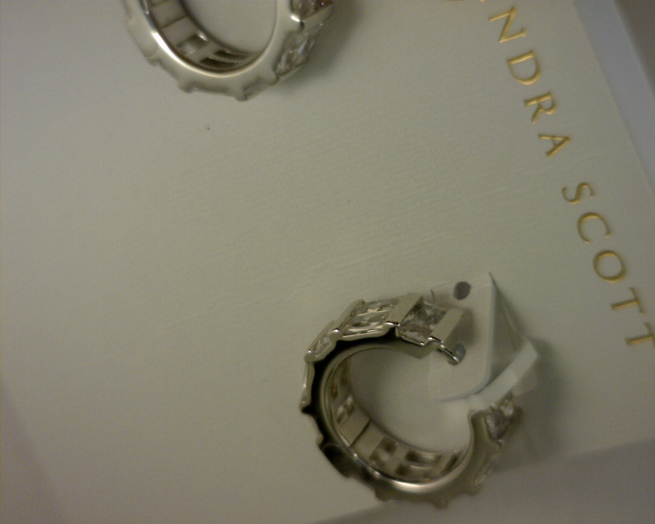 jaimee huggie ear rhodium metal white c