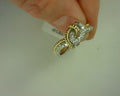 14 KT. TWO TONED DIAMOND LOVE KNOT RING<br>SIZE 7<br>TDW .43