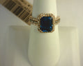 Le Vian® Ring featuring 3 1/2 cts. Deep Sea Blue Topaz™, 1/2 cts. Nude Diamonds™, 1/10 cts. Chocolate Diamonds® set in 14K Strawberry Gold®