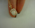 14K STRAWBERRY GOLD  5/8 CT NEOPOLITAN OPAL  1/6CTS CHOCOLATE AND VANILLA DIAMONDS