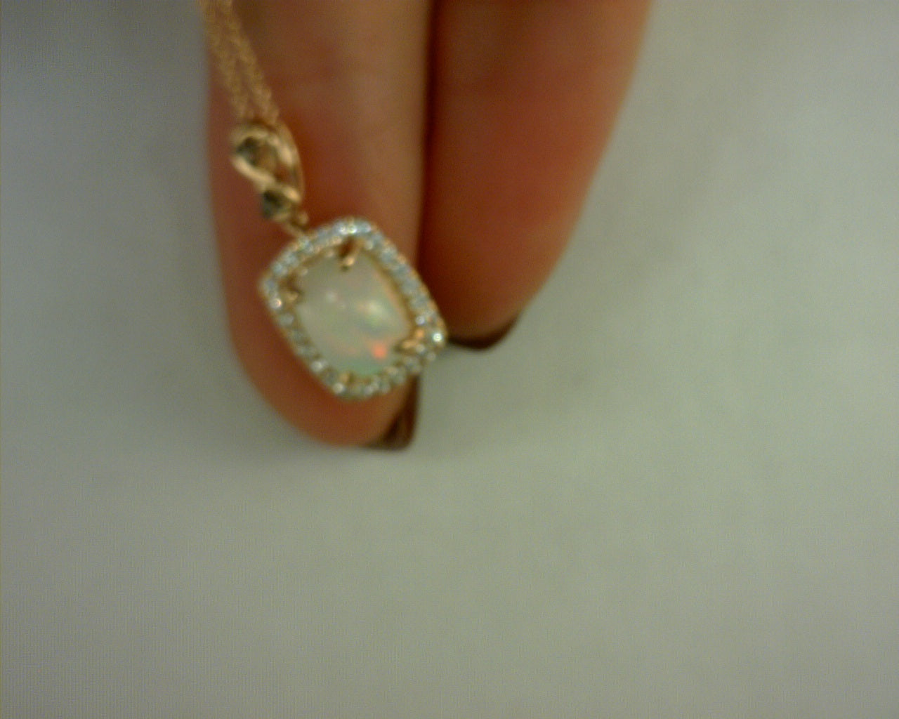 14K STRAWBERRY GOLD  5/8 CT NEOPOLITAN OPAL  1/6CTS CHOCOLATE AND VANILLA DIAMONDS