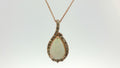 14K STRAWBERRY GOLD 2.20 PEAR OPAL AND NUDE DIAMONDS