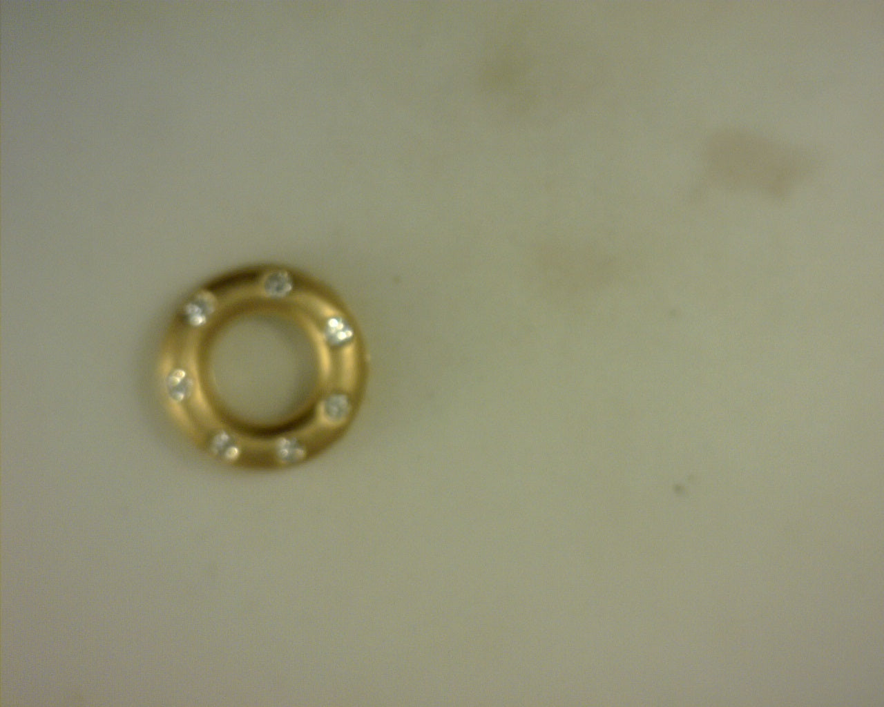 14kt diamond and gold pendant.21cttw