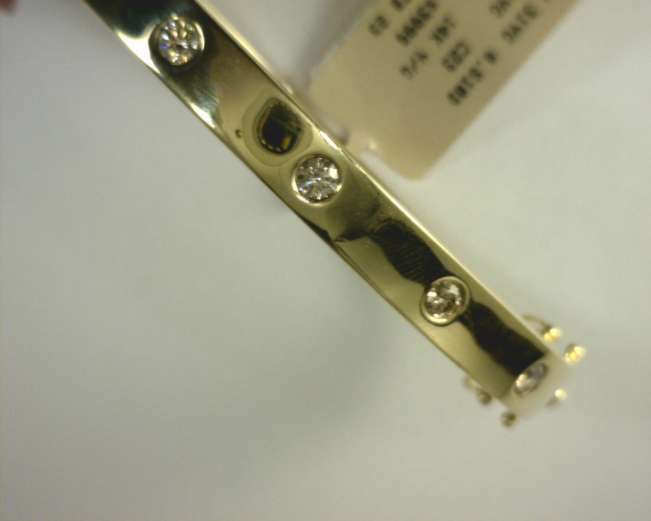 Levian 14k y/g diamond bangle .51ctw