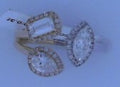 14 KARAT 2 TONE 3 STONE DIAMOND RING .82 ctw