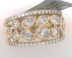 14 KARAT YELLOW GOLD MULTI SHAPE BEZEL SET DIAMONDS