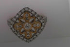 14 KARAT TWO TONED ANTIQUE STYLE DIAMOND RING .55 ctw
