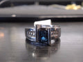 Lady's White 14 Karat Fashion Ring Size 7 With One Emerald Sapphire