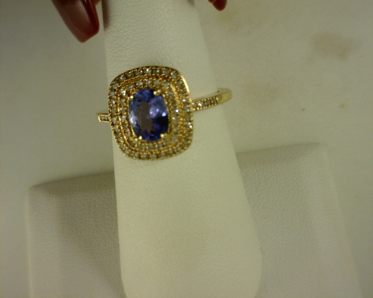 14KTY 1.25CT TANZANITE .33DIAM RING