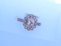 rose gold oval morganite  ring with diamonds
