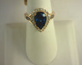Le Vian® Ring featuring 3 cts. Deep Sea Blue Topaz™, 1/10 cts. Chocolate Diamonds®, 3/8 cts. Nude Diamonds™ set in 14K Strawberry Gold®