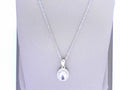 Diamond and White Topaz Birthstone Pendant 10K White Gold