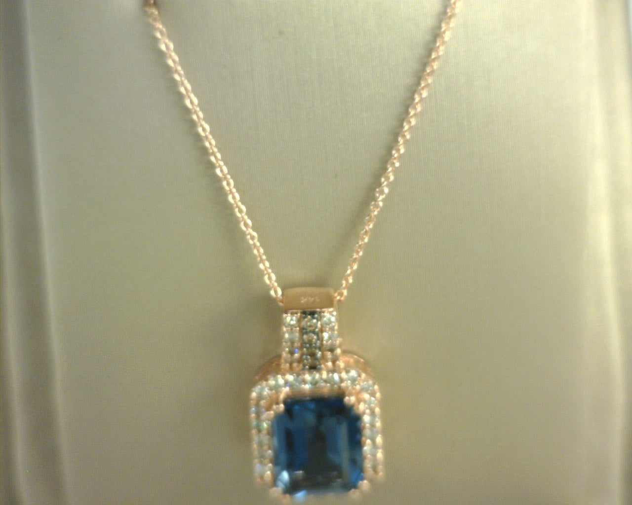 Le Vian® Pendant featuring 3 1/2 cts. Deep Sea Blue Topaz™, 3/8 cts. Nude Diamonds™, Chocolate Diamonds® set in 14K Strawberry Gold®
