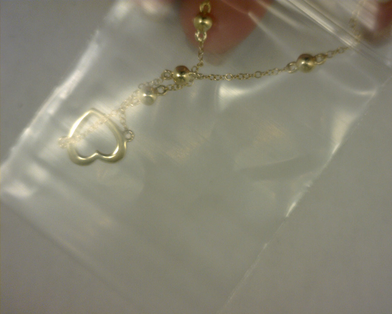 #S2159289 14KT YELLOW GOLD OPEN HEART NUJUKAN CHAIN BRACELET