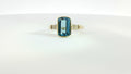 14K HONEY GOLD OCEAN BLUE TOPAZ 2 3/8CTS