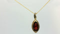 14KT HONEY GOLD WITH 2CT POMENGRANITE GARNET