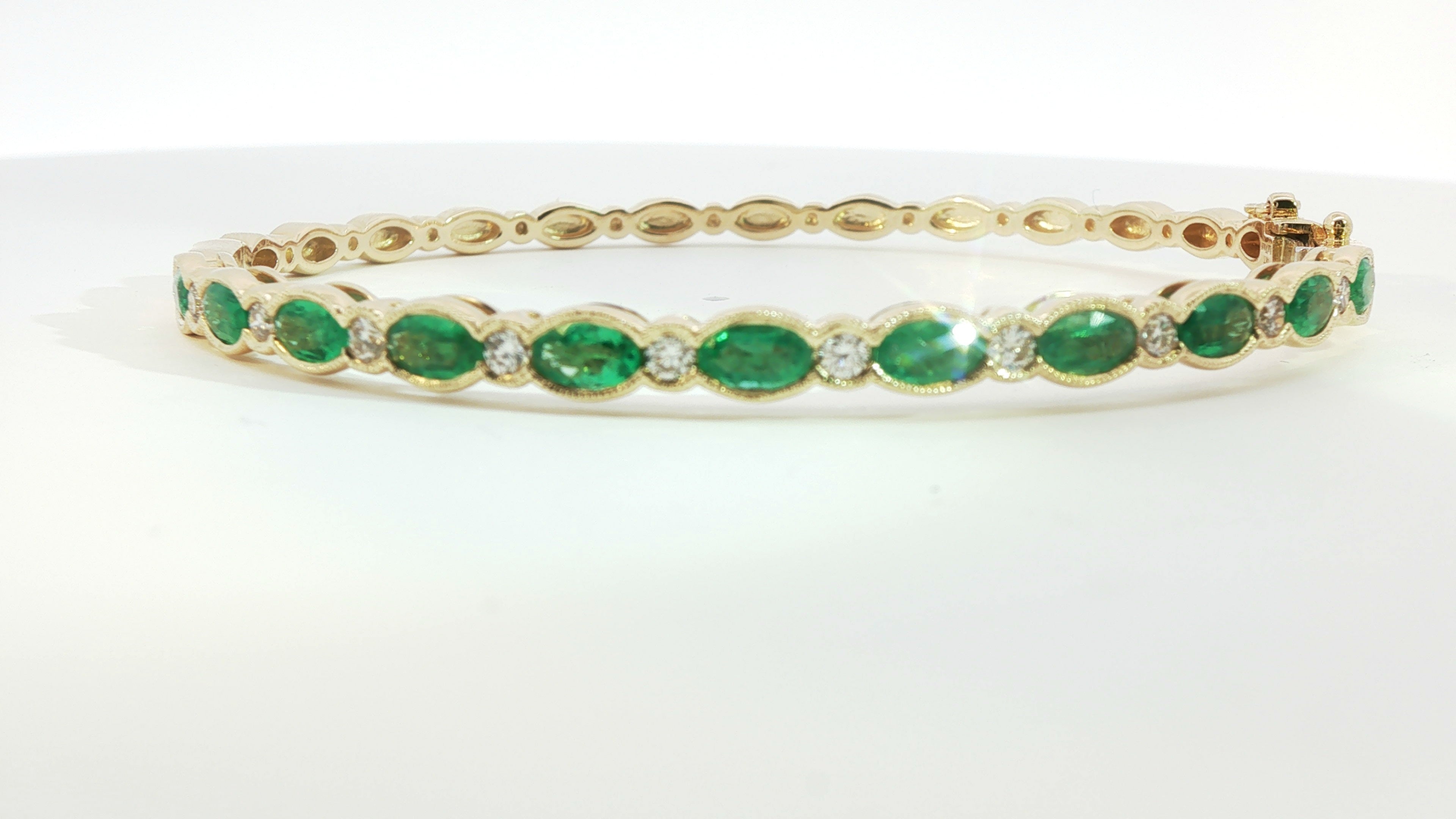 14KT HONEY GOLD COSTA SMERALDA EMERALD 2CTS BANGLE