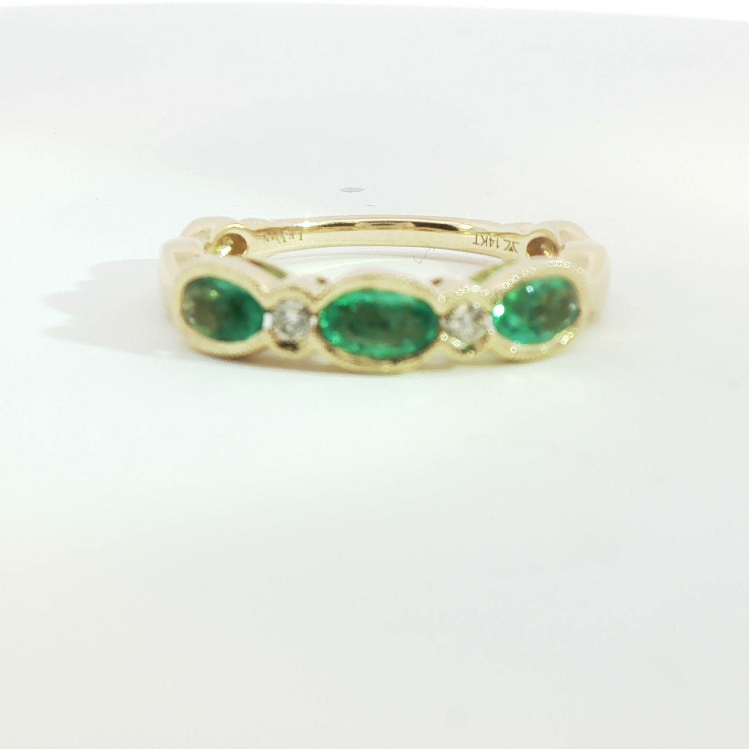 14KT HONEY GOLD WITH 1/2CT COSTA SMERALDA EMERALDS , 1/20CTS VANILLA DIAMONDS