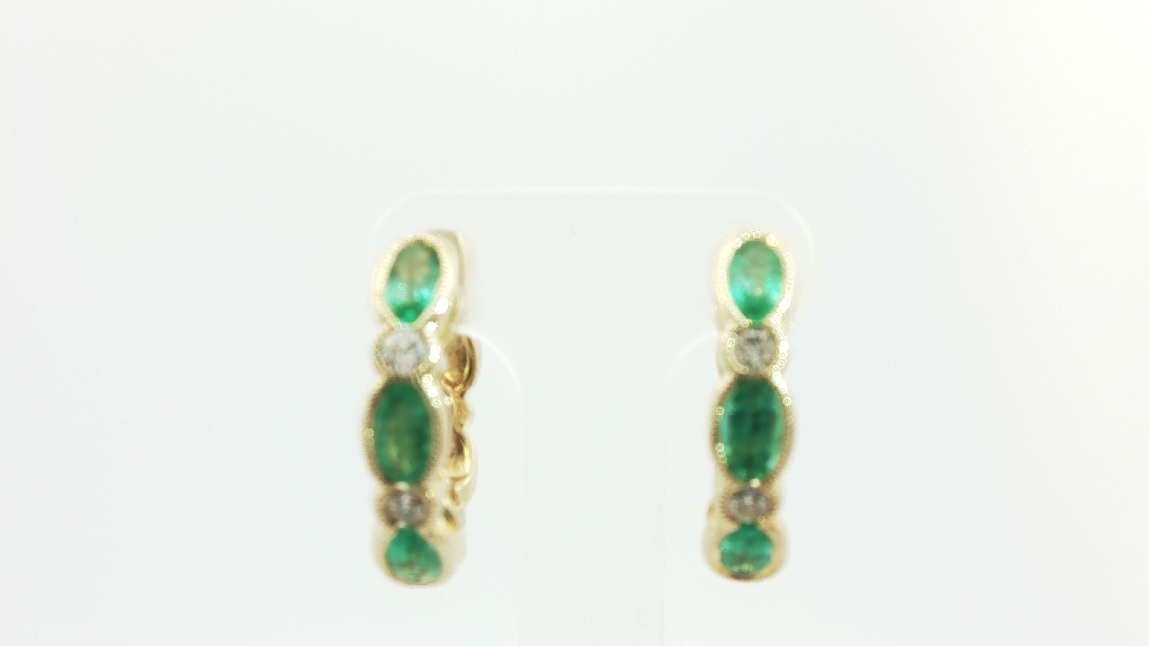 14KT HONEY GOLD  WITH 1 1/8CTS COSTA SMERALDA EMERALDS AND 1/6 VANILLA DIAMONDS