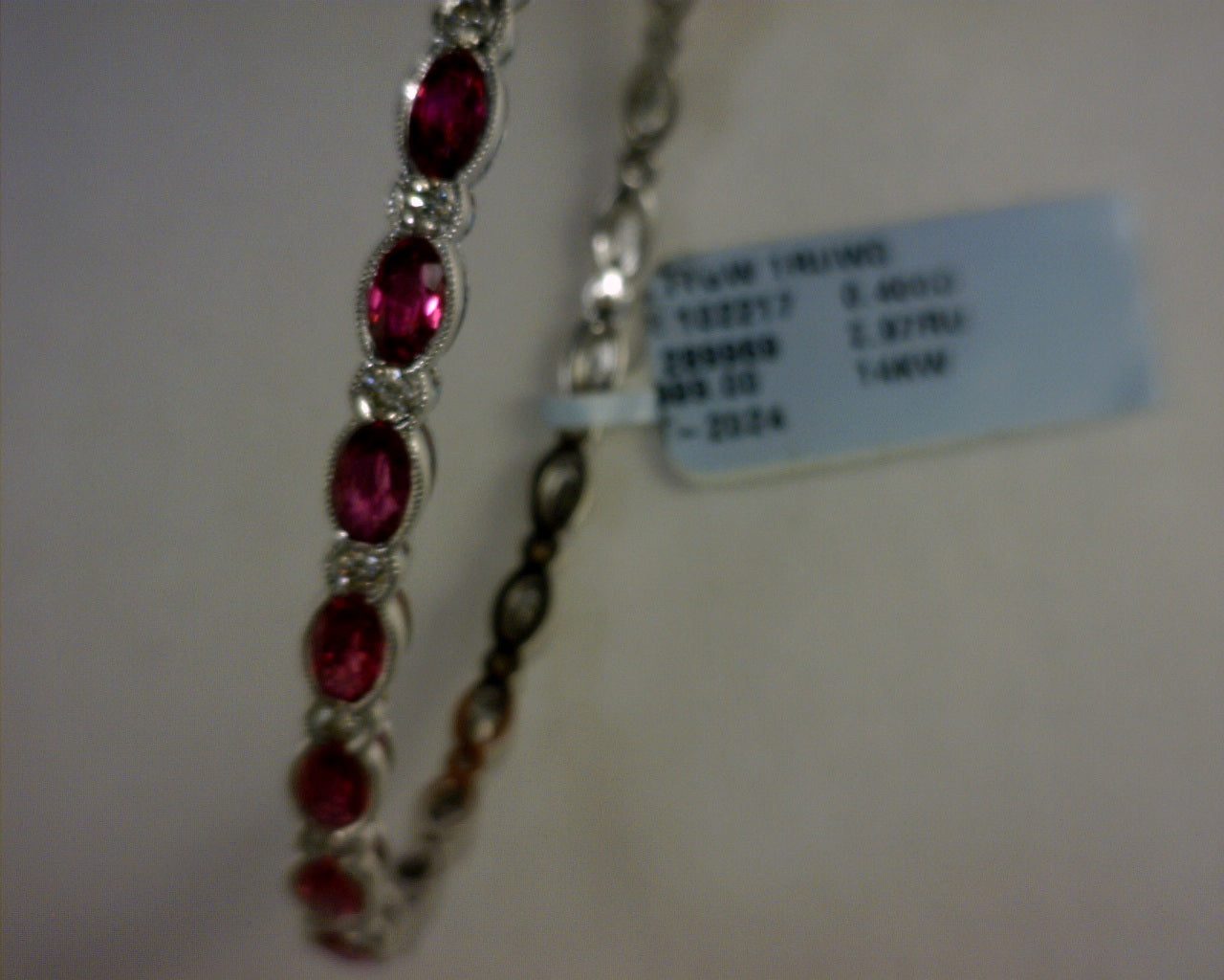 14K WHITE GOLD WITH 3 CTS PASSION RUBY , 3/8CTS VANILLA DIAOMNDS