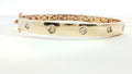 14 KARAT ROSE GOLD BANGLE WITH DIAMONDS
