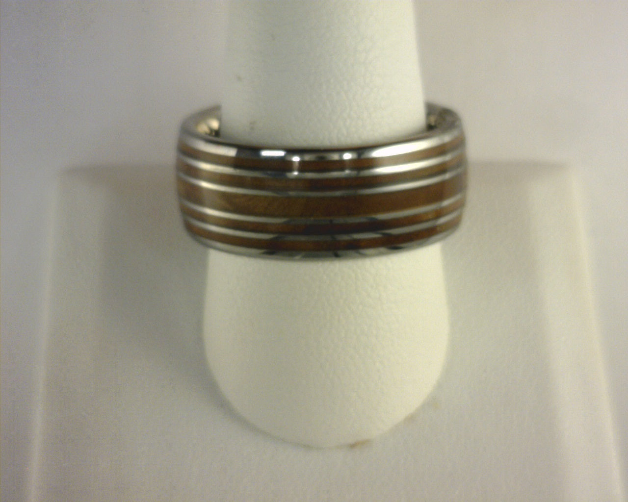 Tennessee Whiskey barrel wedding band 10 mm ring comfort-fit scratch-resistant tungsten carbide with reclaimed wood from whiskey barrels that were once used by the Jack Daniel’s Distillery.