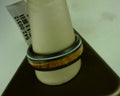 Steel Revolt ROCKSTAR is an 8mm Tennessee Whiskey ring made with guitar string and wood from barrels once used by the Jack Daniel's Distillery
