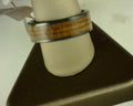 Steel Revolt OUTDOORSMAN is an 8 mm ring with genuine antler and cigar leaf inlay.