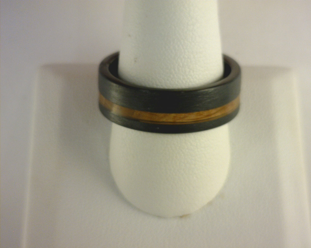 Steel Revolt CHARRED WHISKEY II is an 8mm Tennessee Whiskey ring made with wood from barrels once used by the Jack Daniel's Distillery