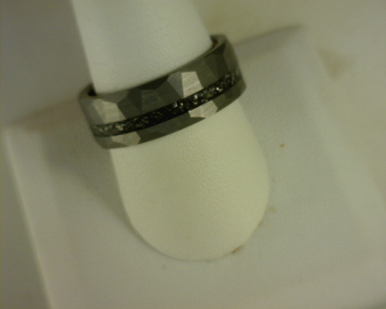 Steel Revolt SPACE TREKKER II is an 8mm diamond cut ring with crushed meteorite