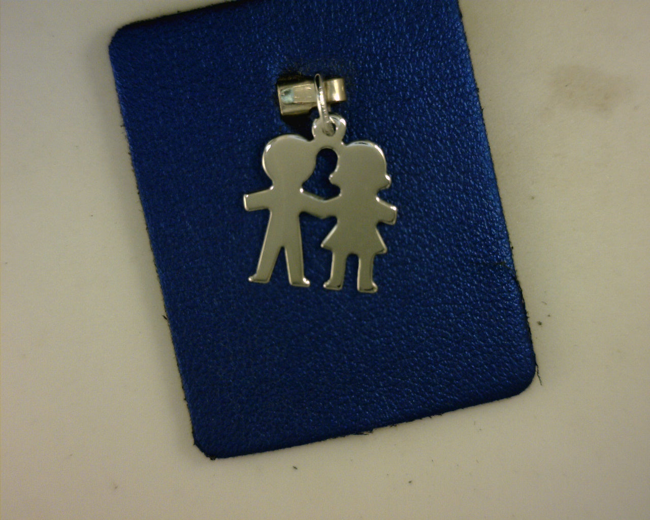 STERLING BOY AND GIRL HOLDING HANDS CHARM