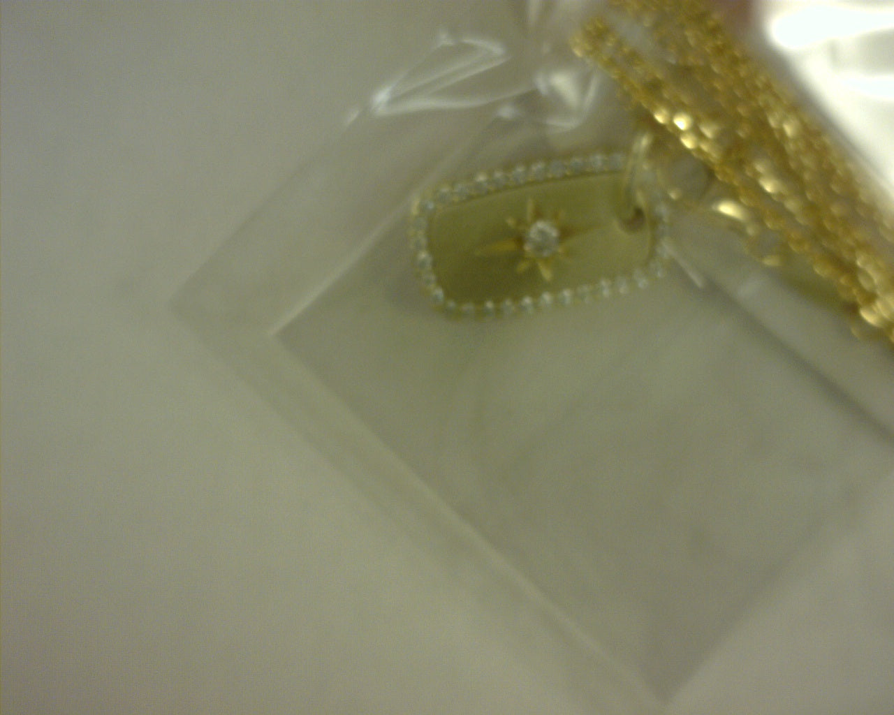 NORTH STAR DOG TAG GOLD PLATED .39 CTW