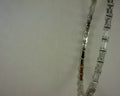 WHITE CZ BAGUETTE SS PLATE FLEX BANGLE 7.8 CTW