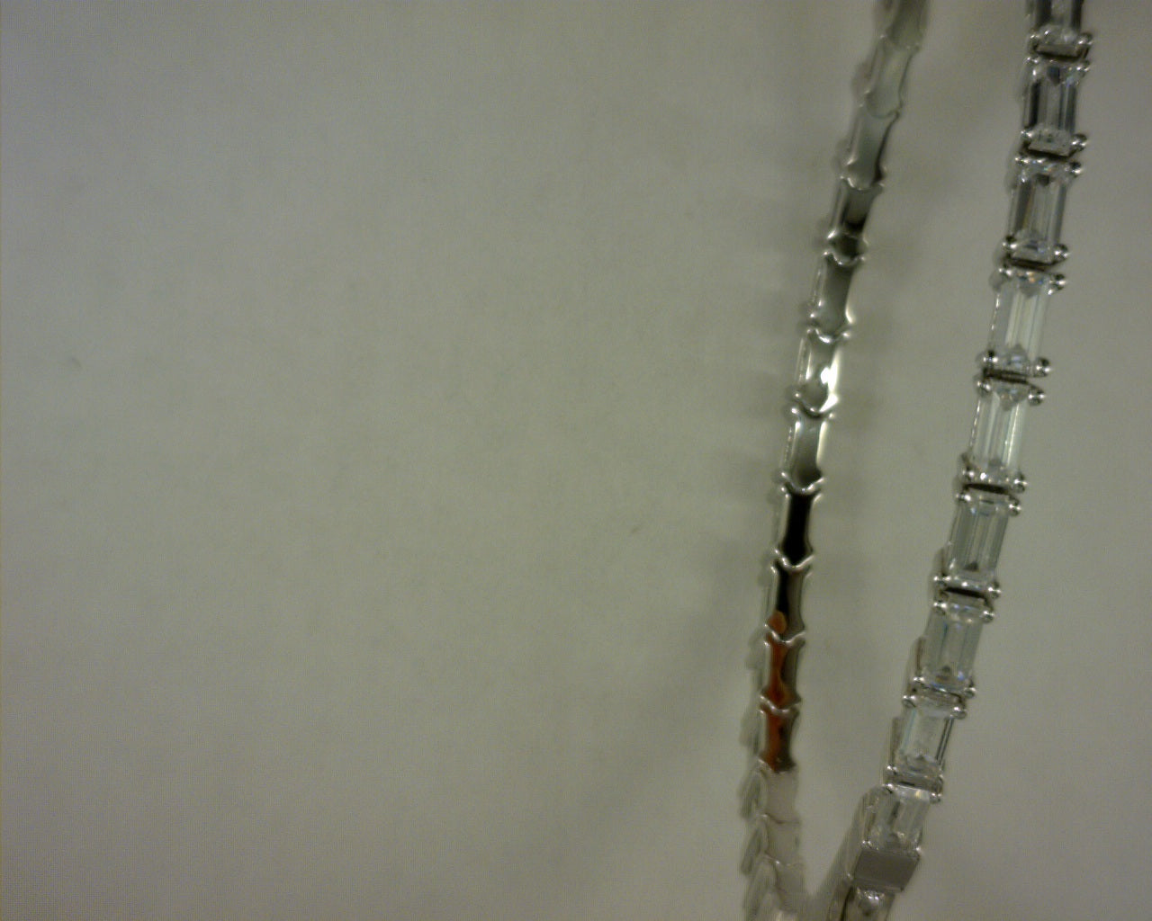 WHITE CZ BAGUETTE SS PLATE FLEX BANGLE 7.8 CTW