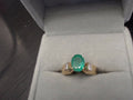 Yellow 14 Karat Ring With One 1.20Ct Oval Emerald And 4=0.04Tw Round Diamonds<br>FINAL SALE