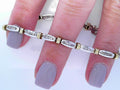 2 toned diamond tennis bracelet with baguetts