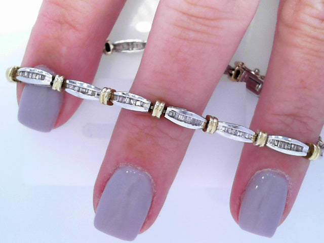 2 toned diamond tennis bracelet with baguetts