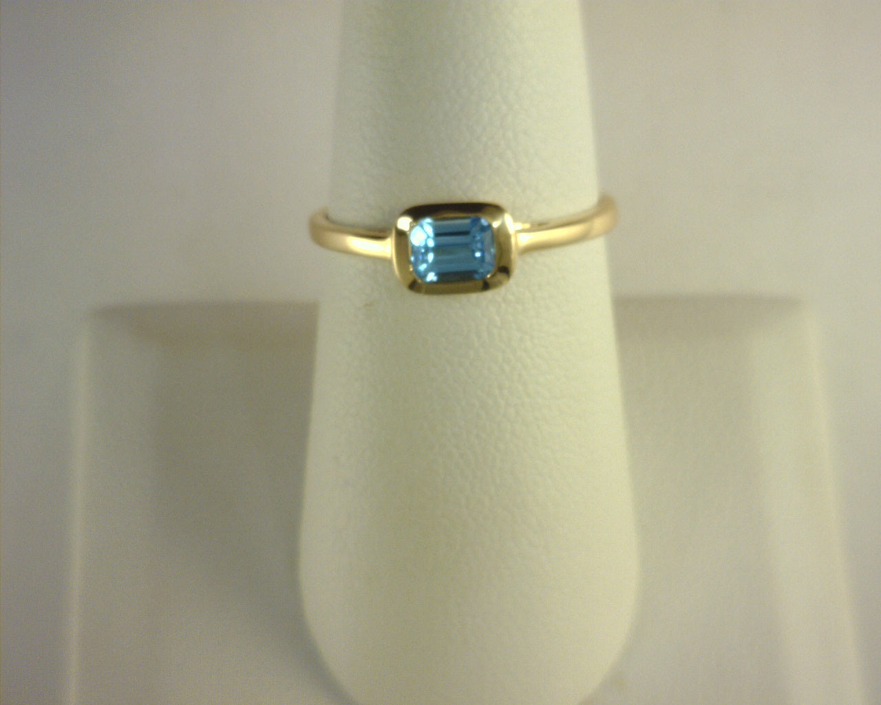 Luxury By Leonardo Blue Topaz Bezel Ring .60cts 14K Yellow Gold