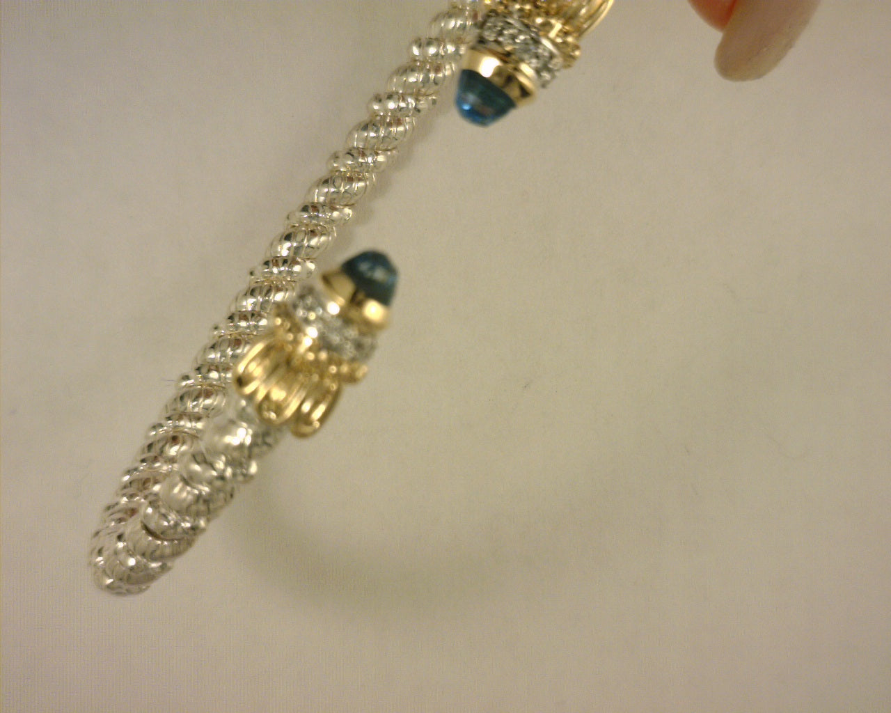 3mm open bangle bracelet 0.08 ct 14karat  yellow gold and sterling silver  BLUE TOPAZ sz. 2 3/8
