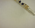 SZ. 2 3/8 open cuff 0.08 ct 14 kt yellow gold and SS with BLUE LAPIS