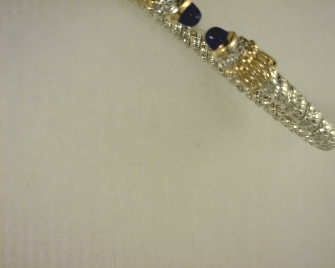 SZ. 2 3/8 open cuff 0.08 ct 14 kt yellow gold and SS with BLUE LAPIS