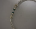 ss cuff with 14 karat gold and diamonds with emerald caps 2 3/8