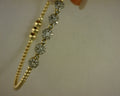 14  KARAT BUJUKAN GOLD AND DIAMOND BANGLE  #S2136147