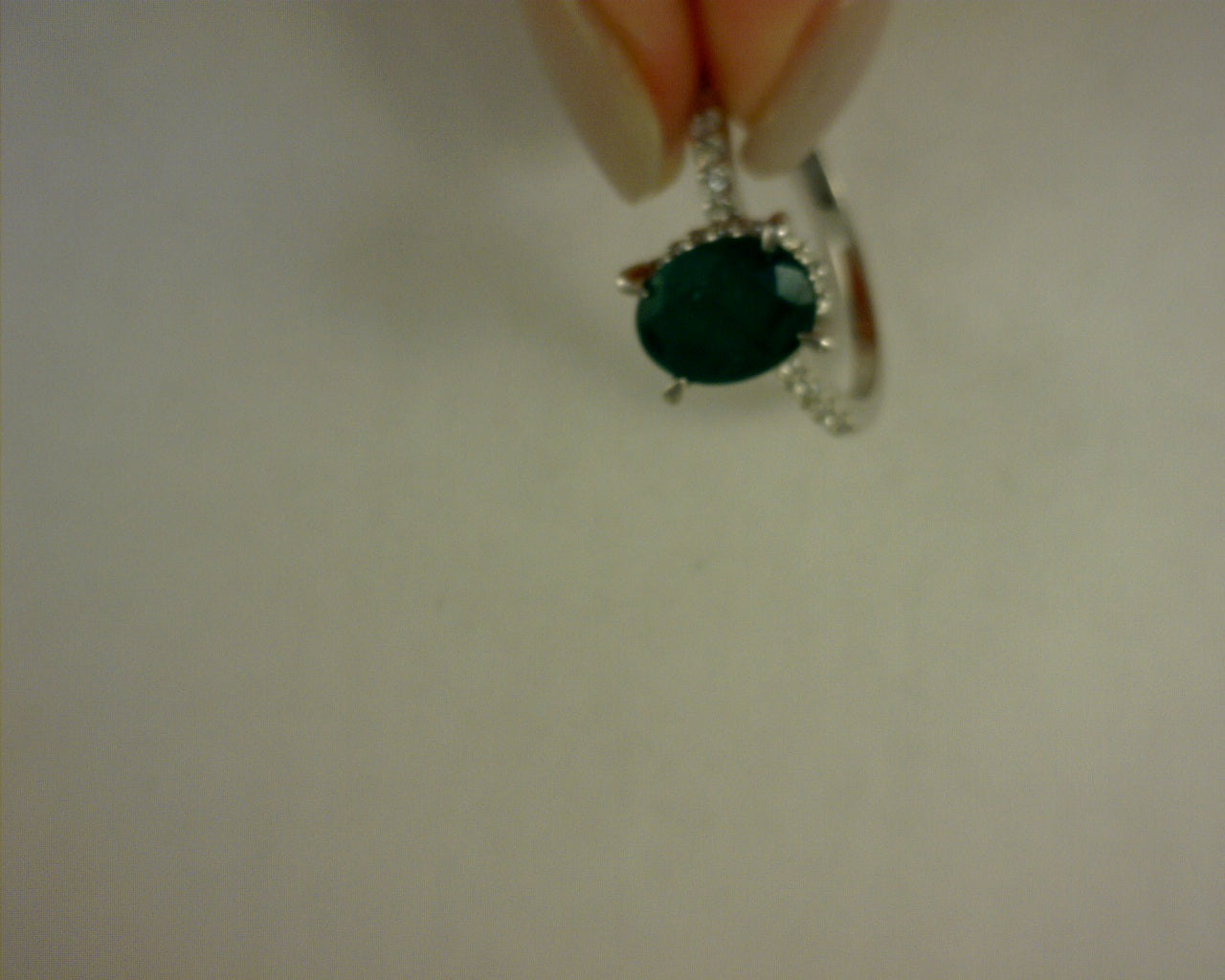 14 KARAT WHITE GOLD EMERALD RING  1.5 CARAT EMERAL .29 CARAT DIAMONDS