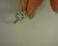 14 KARAT WHITE GOLD DIAMOND HALO ROUND CENTER RD .75 CENTER 1.35 TCW