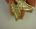 14 KARAT YELLOW GOLD BUTTERFLY SLIDE 8.3G