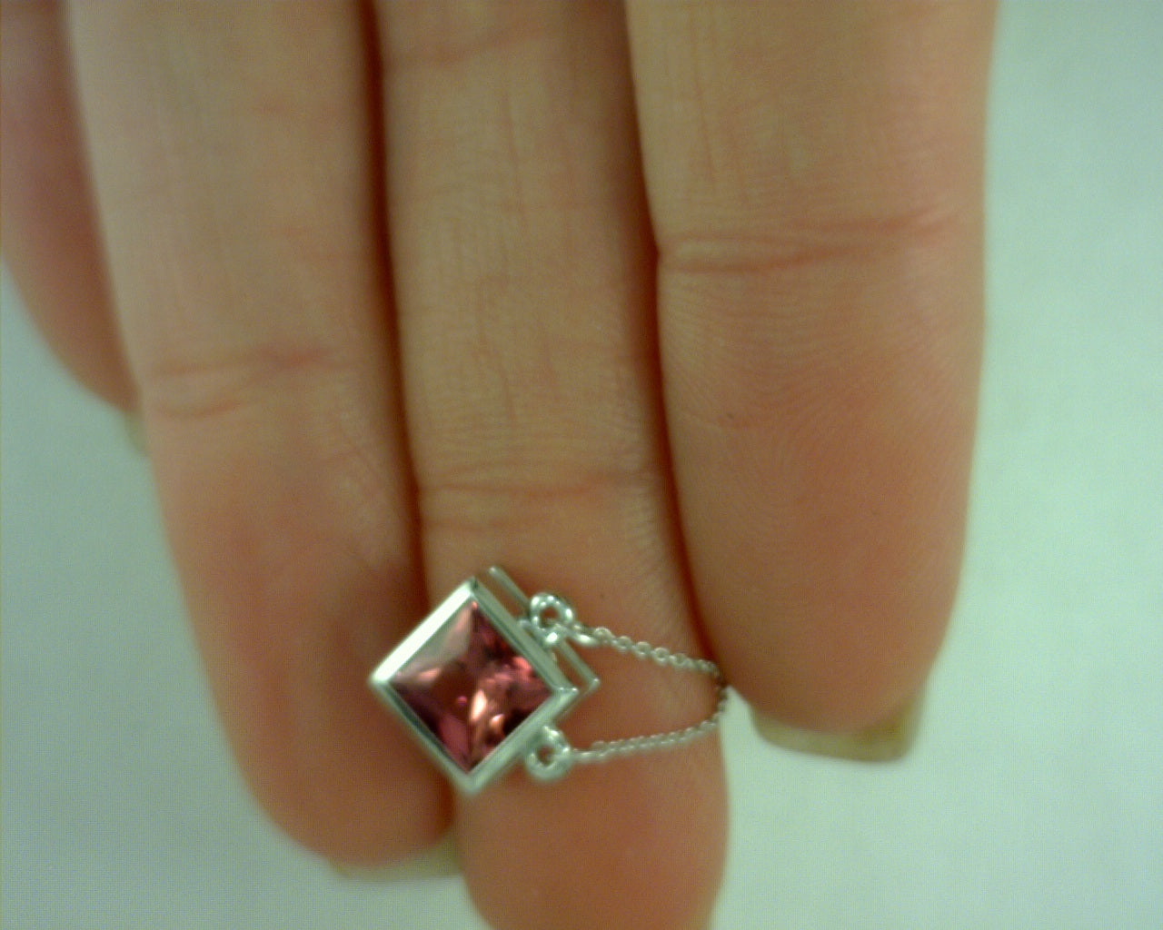 14 karat white gold with pink tourmaline princess cut pendant