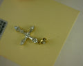 14 KARAT YELLOW GOLD DIAMOND CROSS 0.671 TCW